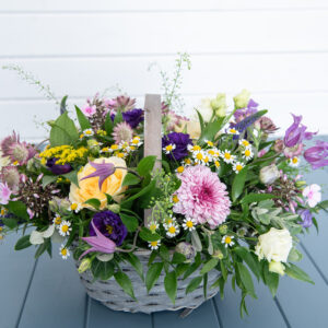Colourful basket of mixed flowers